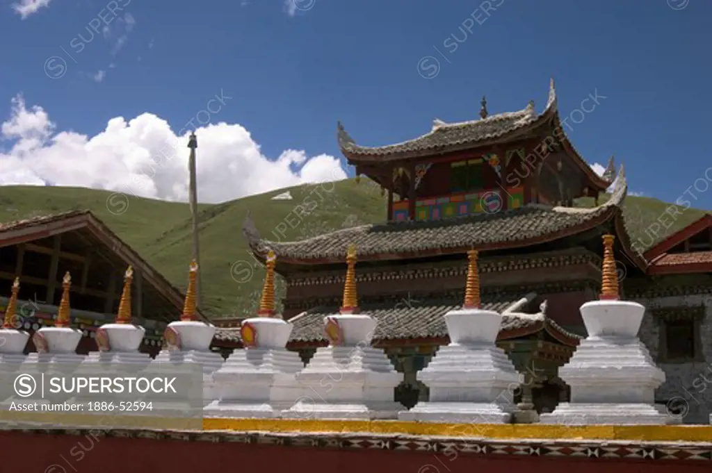 A row of Stupas or Chortens at Tagong  Monastery (Lhagang Gompa) - Kham (E. Tibet), Sichuan Province, China