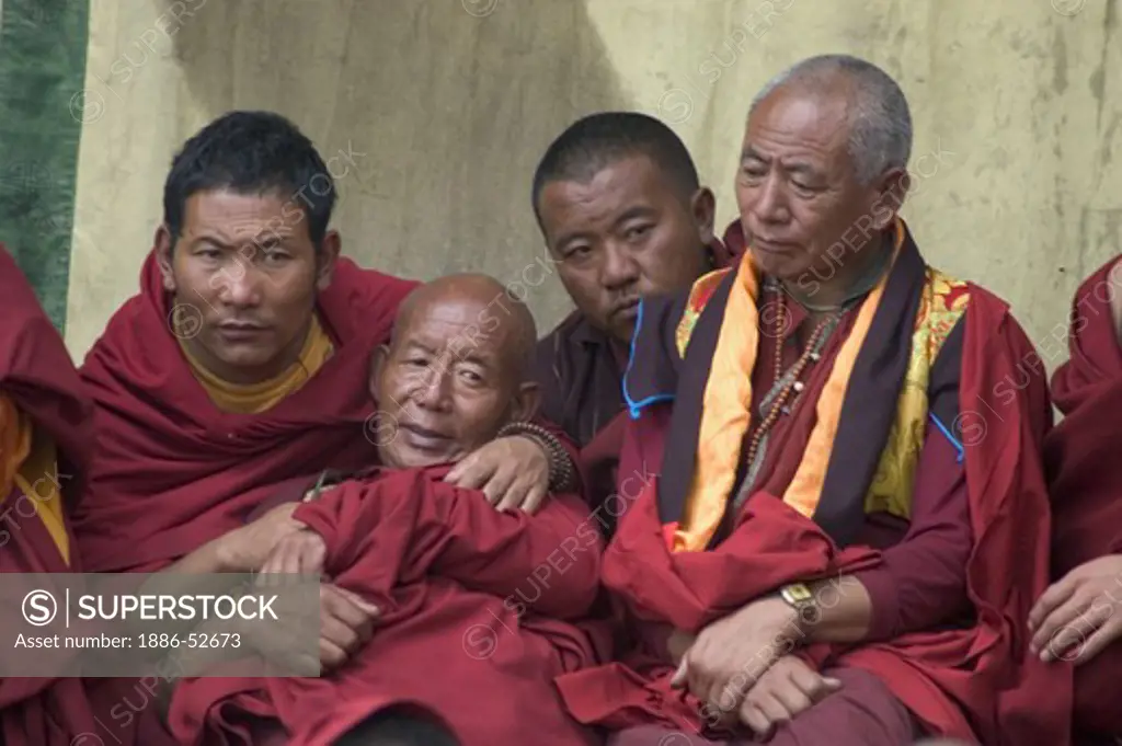 Nyingmapa monks enjoy watching the Monlam Chenmo dances, Katok Dorjeden Monastery - Kham, (Tibet), Sichuan, China