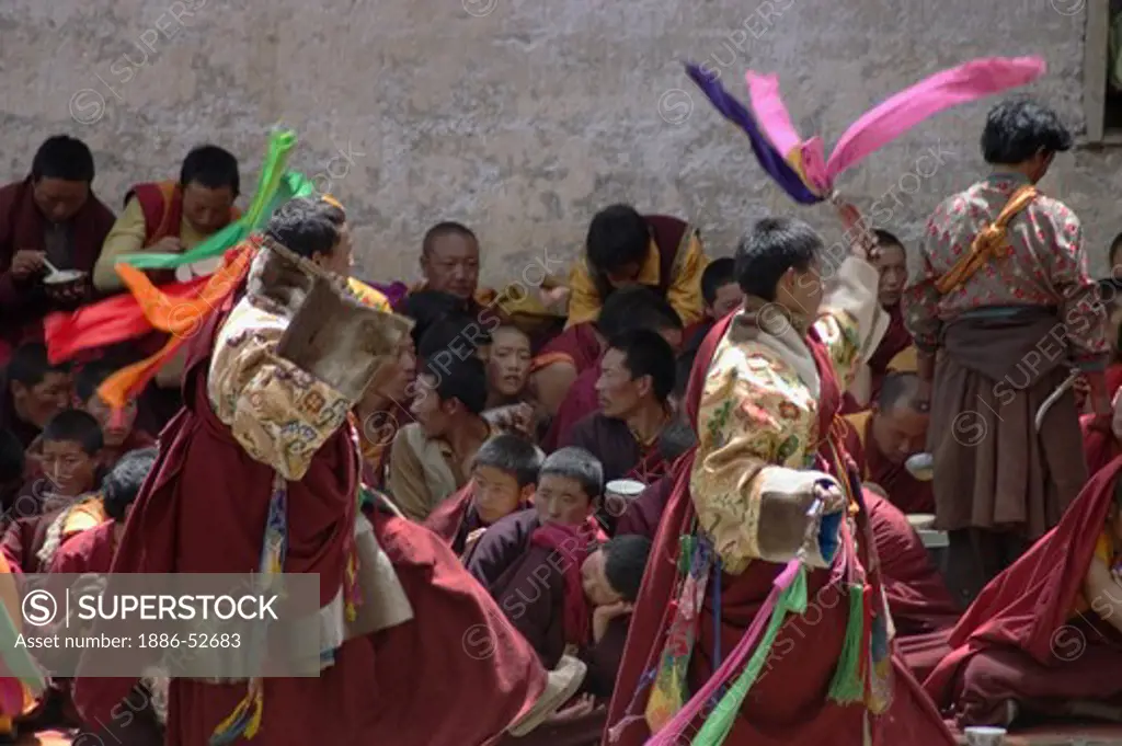 Monks dance without masks the first day of the Monlam Chenmo, Katok Dorjeden Monastery - Kham, (Tibet), Sichuan, China