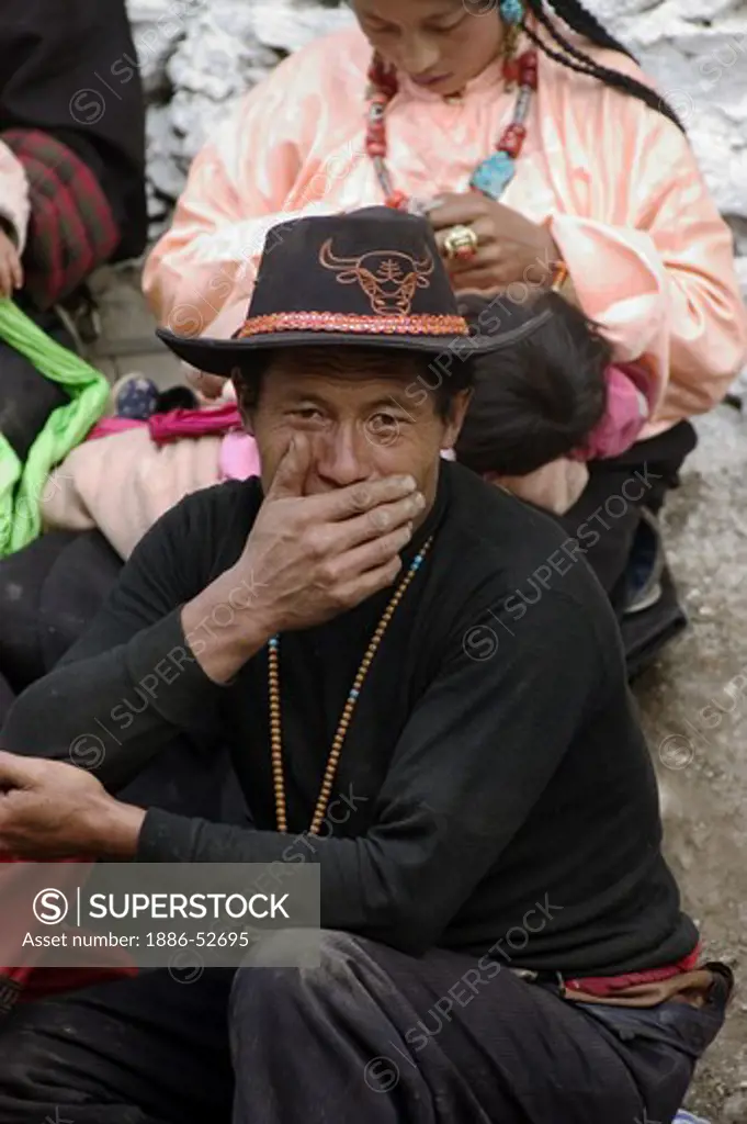 Khampa man with Yak hat at the Monlam Chenmo, Katok Dorjeden Monastery - Kham, (Tibet), Sichuan Province, China