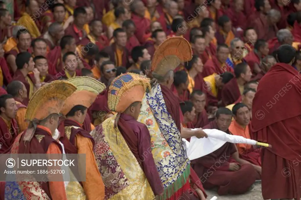 Nyingma monks with khatok at the Monlam Chenmo, Katok Dorjeden Monastery - Kham, (Tibet), Sichuan Province, China