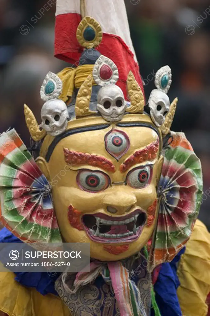 Masked dancer with skulls representing impermanance, Monlam Chenmo, Katok Monastery - Kham, (Tibet), Sichuan, China