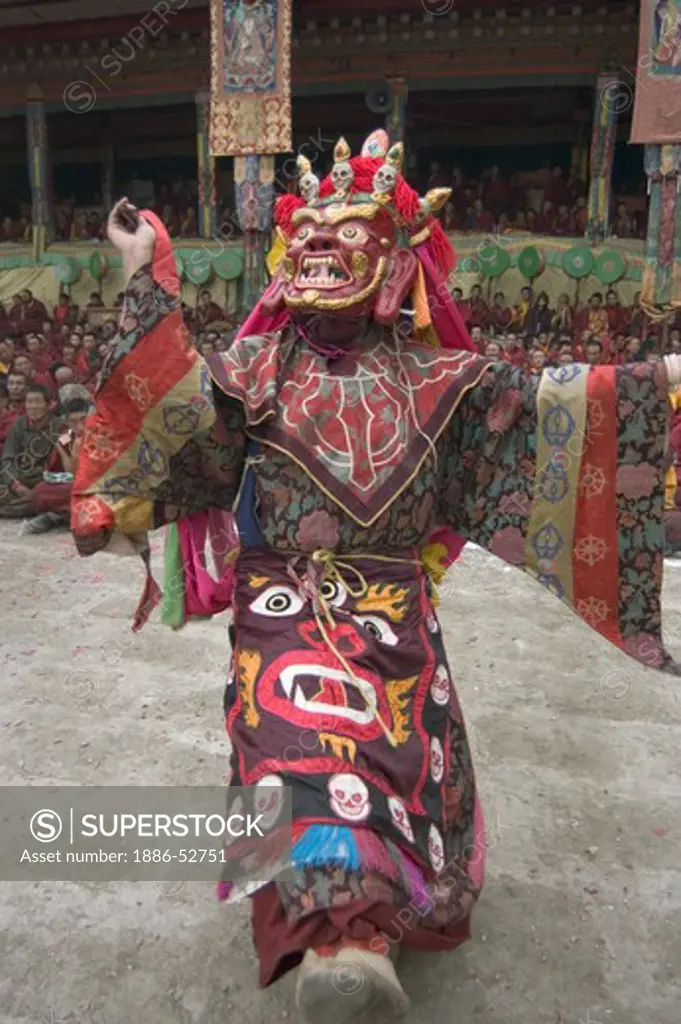 Masked dancer tames demons & negativity  at the Monlam Chenpo, Katok Dorjeden Monastery - Kham, (Tibet), Sichuan, China