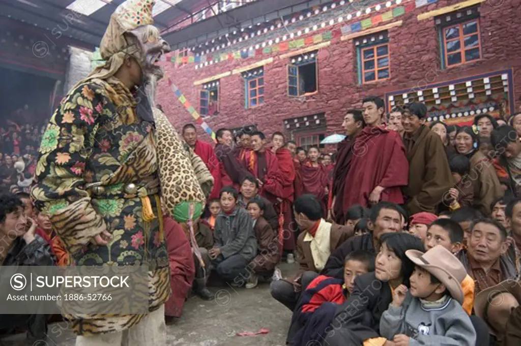 Disciplinarian Clown at the Nyingma Cham Dances, Katok Dorjeden Monastery - Kham, (eastern, Tibet), Sichuan Province, China