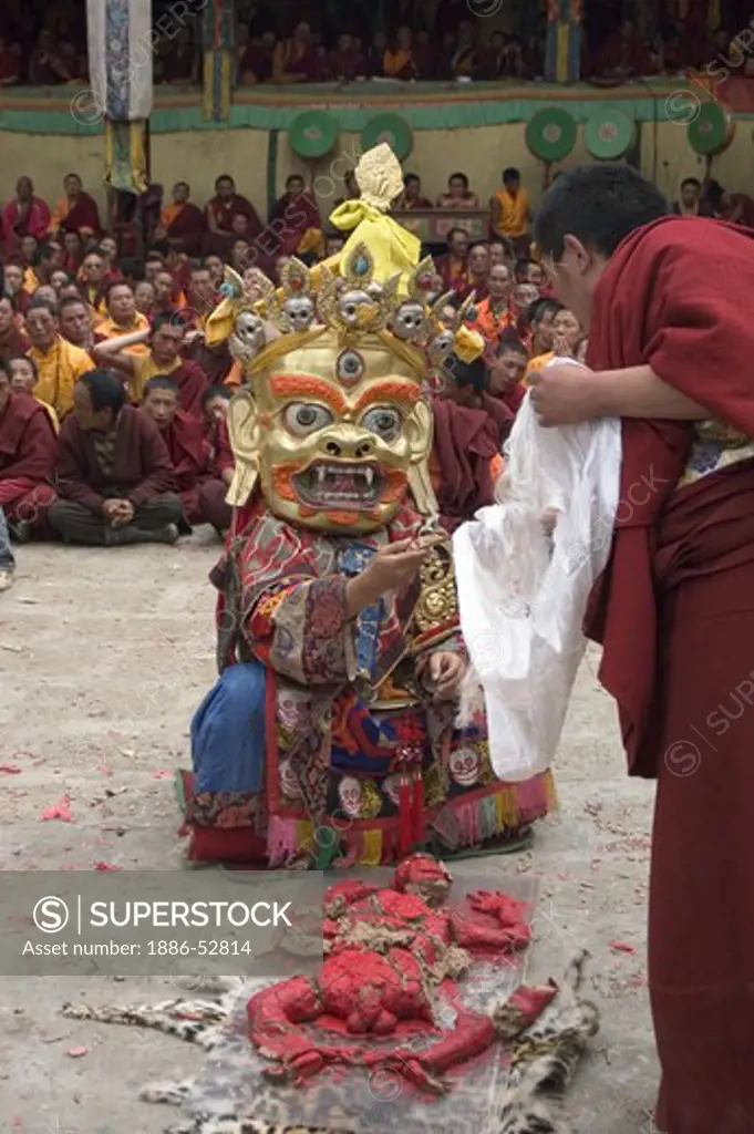 Human effigy is cut up to remove negativity at the Monlam Chenpo, Katok Dorjeden Monastery - Kham, (Tibet), Sichuan, China