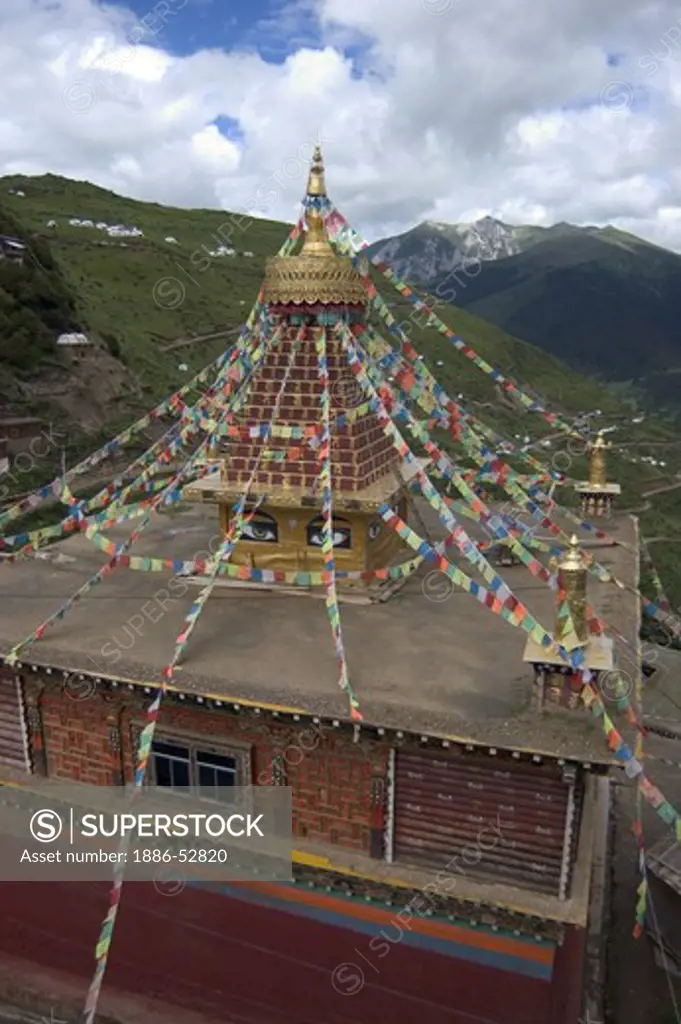 Temple with stupa & prayer flags on top, Katok Dorjeden Monastery - Kham, (eastern, Tibet), Sichuan Province, China