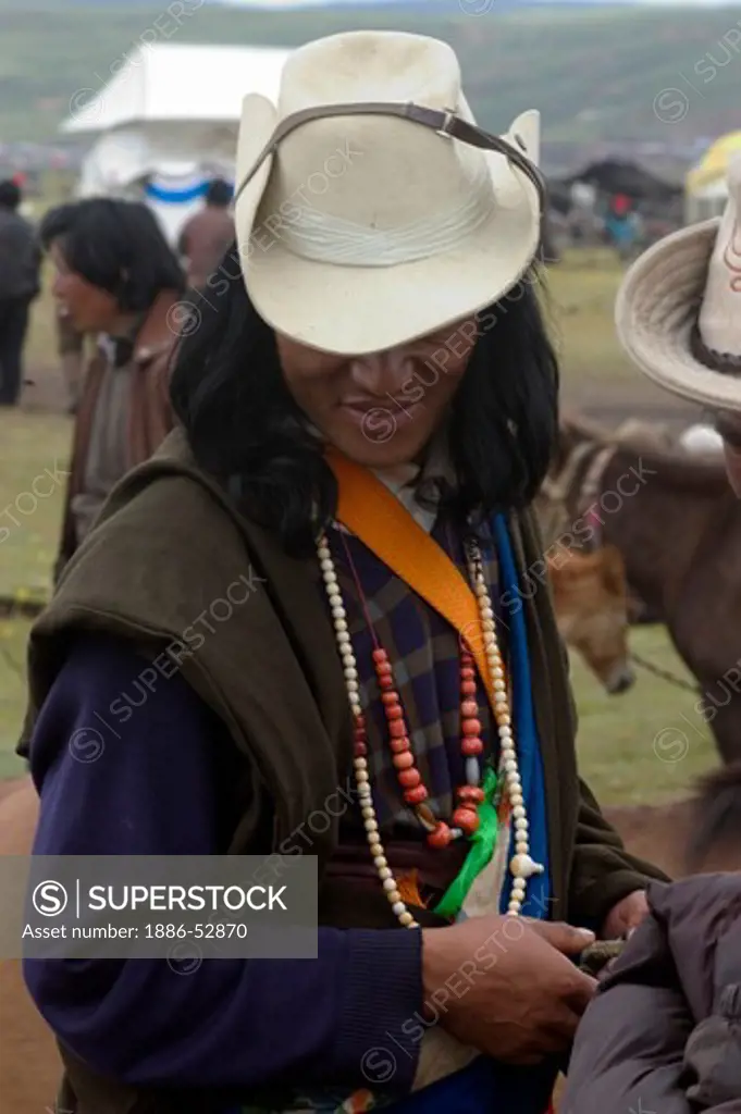 Khampa cowboy at the Litang Horse Festival in Kham - Sichuan Province, China, (Eastern, Tibet)
