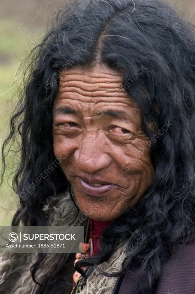 Old Khampa cowboy at the Litang Horse Festival in Kham - Sichuan Province, China, (Eastern, Tibet)