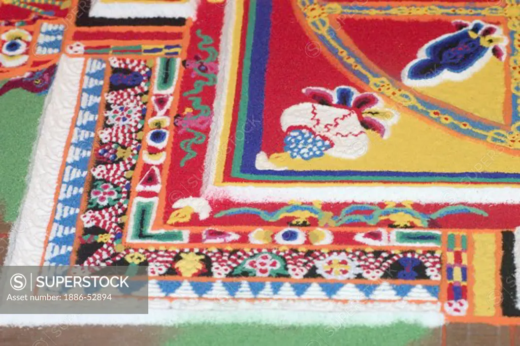 A sand mandala in progress at the Lhakhang Karporling Chapel of Litang Chode Monastery - Kham, Sichuan, China, (Tibet)