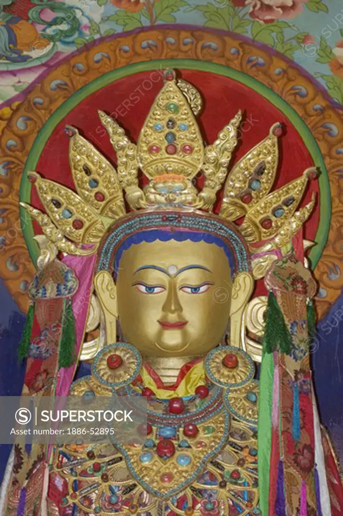 Statue of Sakyamuni Buddha with jewels at the Lhakhang Karporling of Litang Chode Monastery - Kham, Sichuan, China, (Tibet)