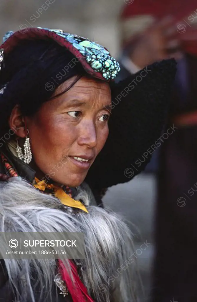 LADAKHI WOMAN showing familial wealth via her PERAK, traditional head piece of silver, coral and TURQUOISE - LADAKH, INDIA