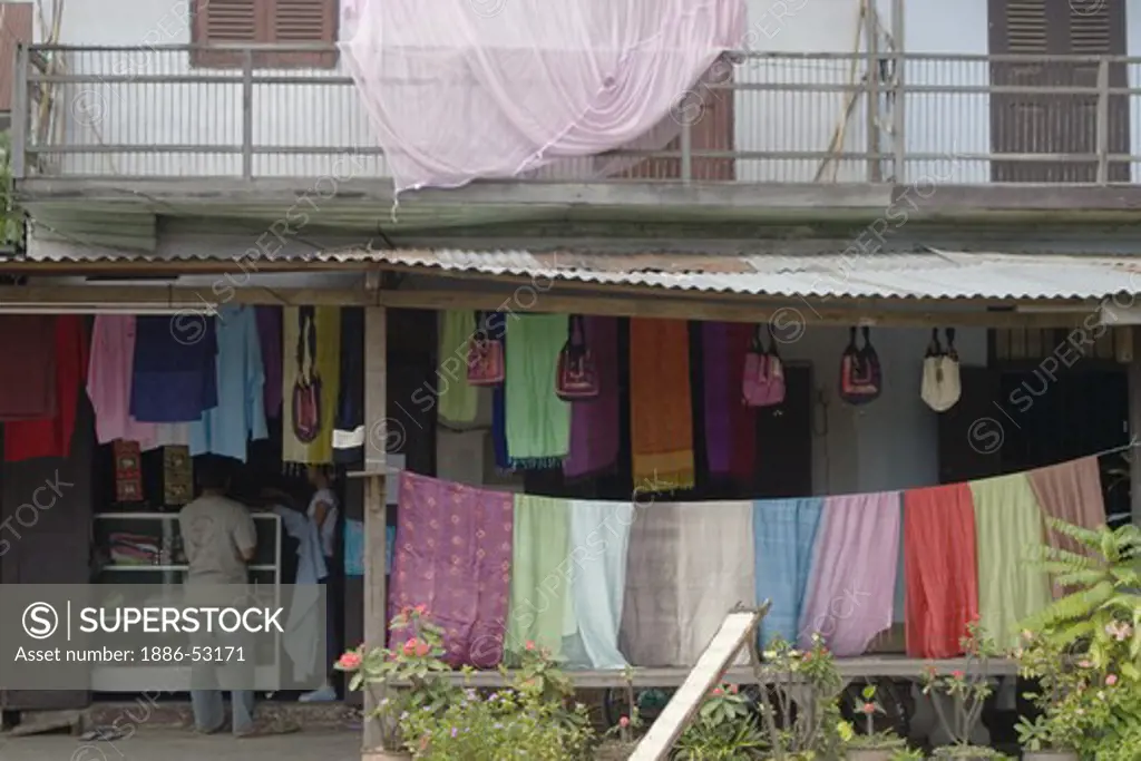 Colorful laundry drying in the former French Provincial town of LUANG PROBANG - LAOS