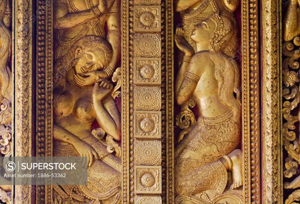 Semi-erotic Ramayana scenes of the Hohng Kep Mien (royal funerary carriage house) at Wat Xieng Thong, built by King Setthathirat in 1560 - LUANG PROBANG, LAOS