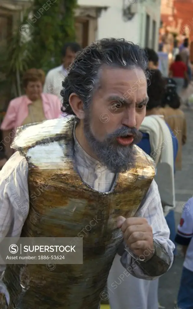 An actor preforms as DON QUIJOTE the mascot of the  CERVANTINO INTERNATIONAL FESTIVAL -  GUANAJUATO, MEXICO