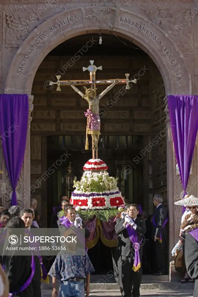 Statue of CHRIST ON THE CROSS leaves TEMPLO DEL ORATORIO DE SAN FELIPE NERI for EASTER PROCESSION - SAN MIGUEL DE ALLENDE, MEXICO