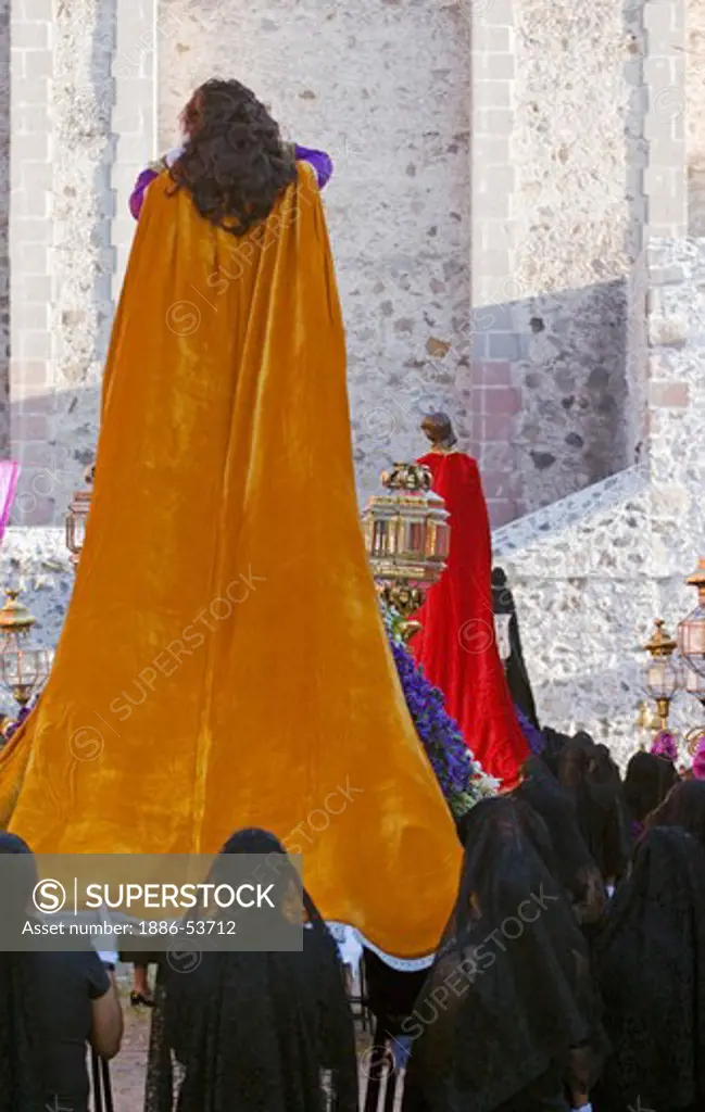 Religious statues of MARY MAGDALENE & Saint Thomas Aquinas are carried during EASTER PROCESSION - TEMPLO DEL ORATORIO, SAN MIGUEL DE ALLENDE, MEXICO