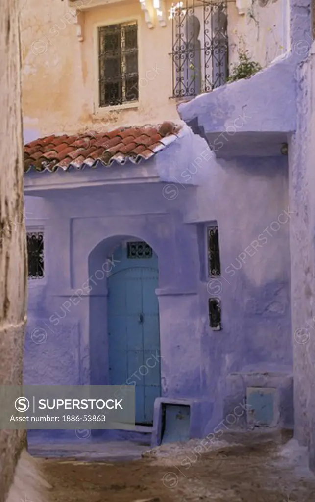 HOUSES in the MEDINA are painted beautiful pastel colors in CHECHAOUEN in the RIF MOUNTAINS of MOROCCO