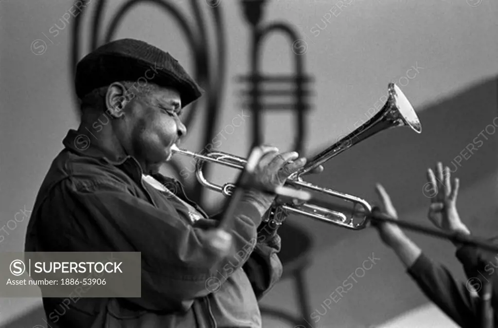 DIZZY GELLESPIE plays his trumpet at the MONTEREY JAZZ FESTIVAL - MONTEREY, CALIFORNIA