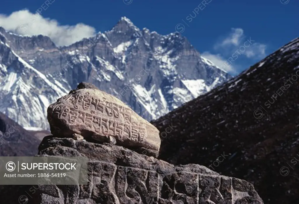 Carved Mani stone with LOTSE Peak as a dramatic backdrop -  KHUMBU DISTRICT, NEPAL