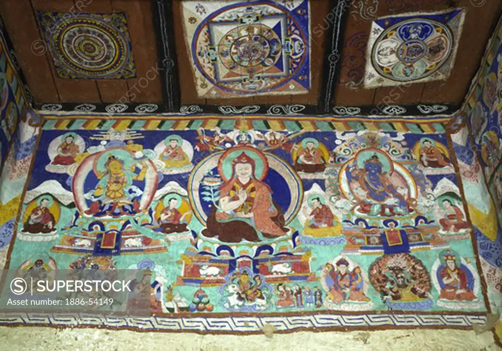 FRESCO of TIBETAN SAINTS and BUDDHAS painted on the inside walls of a CHORTEN near PUGMI VILLAGE - DOLPO, NEPAL