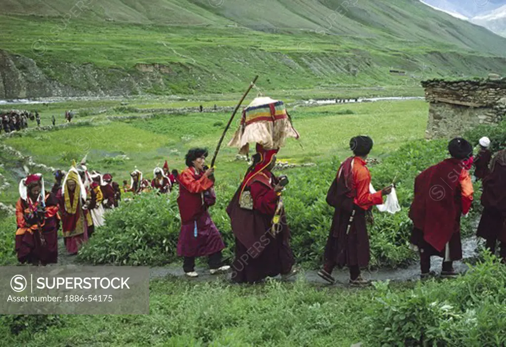 PROCESSION of monks to JAGLUNG MONASTERY at Tibetan Buddhist FESTIVAL in the DO TARAP VALLEY - DOLPO DISTRICT, NEPAL