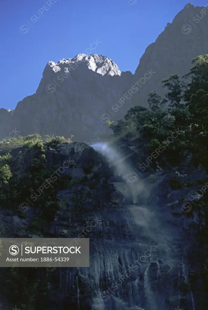 One of the many waterfalls of MILFORD SOUND (actually a FIORD) - FIORDLAND  NATIONAL PARK, NEW ZEALAND'S SOUTH ISLAND