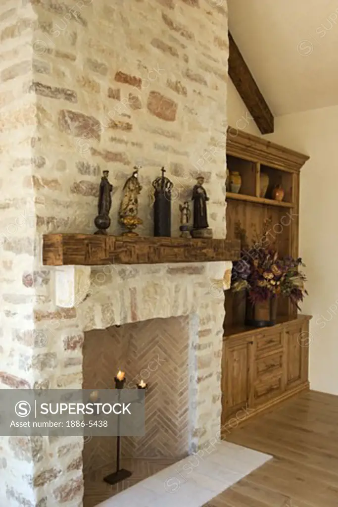 HARD WOOD FLOOR, STONE FIREPLACE, built in CABINETS, and statuary in a  LIVING ROOM - CALIFORNIA LUXURY HOME