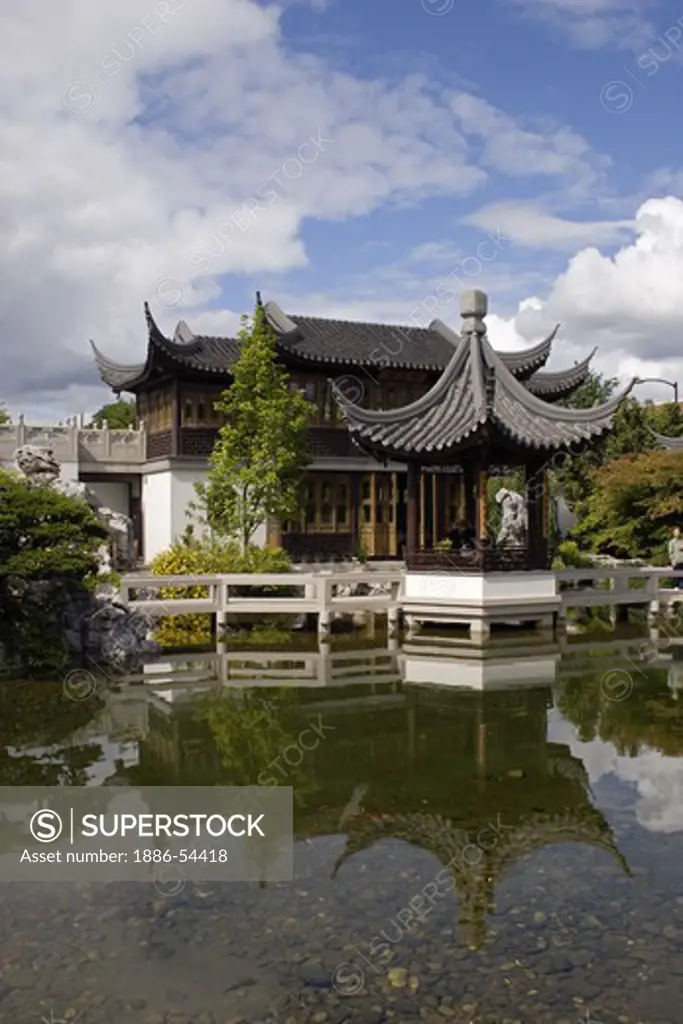 A pavilion & the Tea House sits across Zither Lake at the Portland Classical Chinese Garden,  an authentically built Ming Dynasty style garden - PORTLAND, OREGON