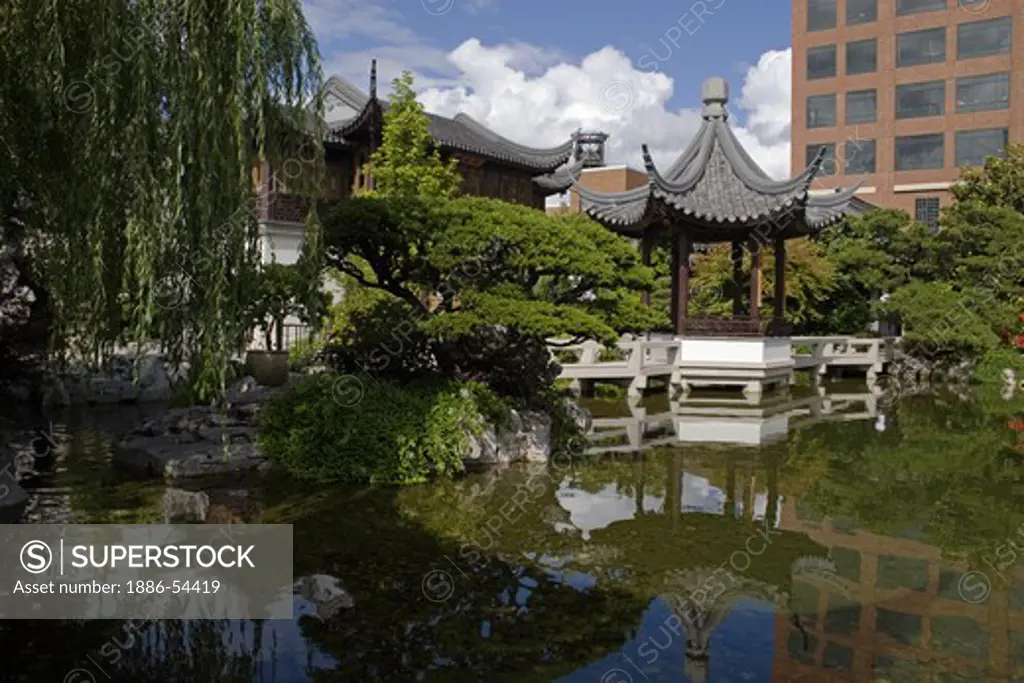 A pavilion sits above Zither Lake at the Portland Classical Chinese Garden,  an authentically built Ming Dynasty style garden - PORTLAND, OREGON