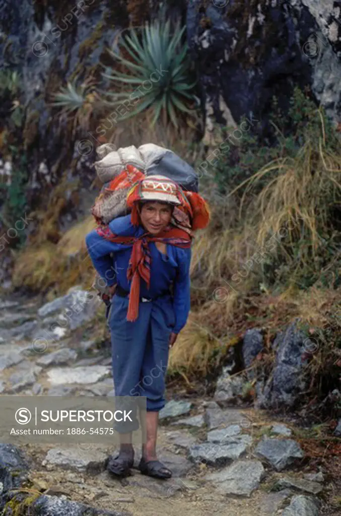Young porter on the INCA TRAIL to MACHU PICCHU - PERU