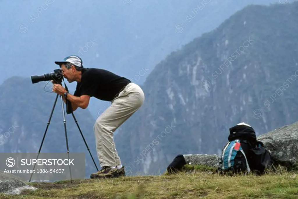 John Price works with his camera - INCA RUINS of MACHU PICCHU, PERUVIAN ANDES