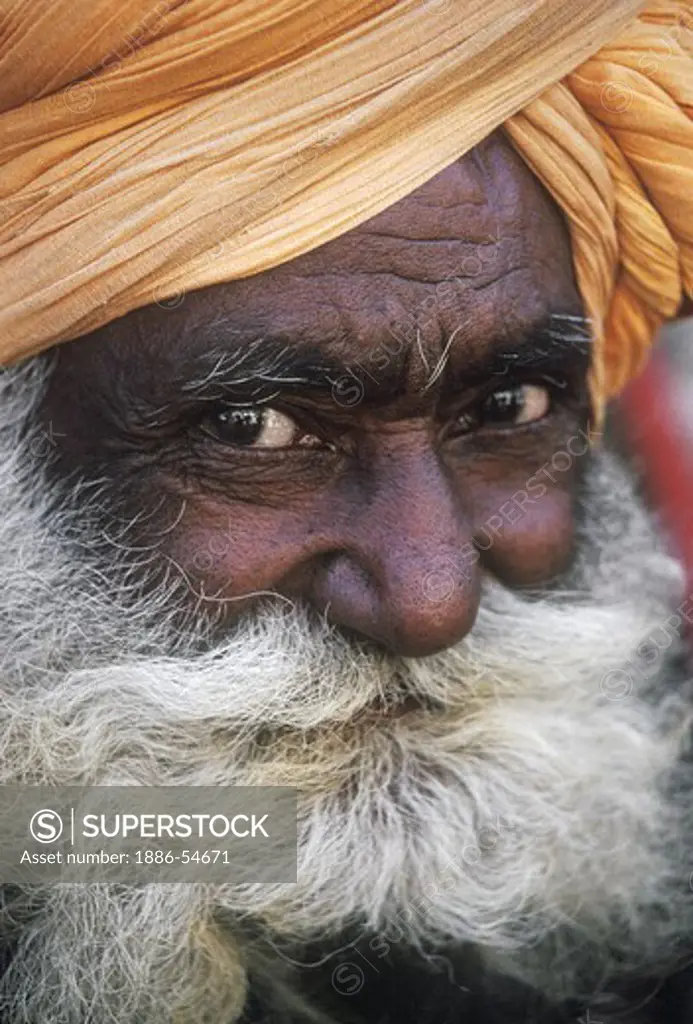 RAJASTHANI MAN with a large MUSTACHE and BEARD and a TURBAN (head wrap) at the PUSHKAR CAMEL FAIR - RAJASTHAN, INDIA