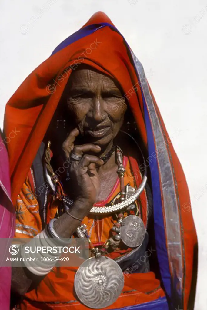 BANJARI TRIBAL WOMAN with traditional SILVER JEWELRY at the PUSHKAR CAMEL FAIR - RAJASTHAN, INDIA