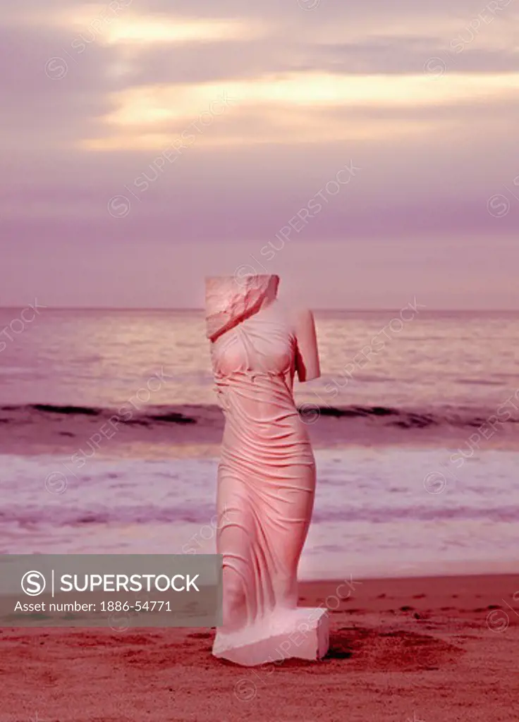 SCULPTURE carved from LIMESTONE of a full figured woman draped in cloth on beach at sunset ARTIST MARTON VARRO, Hungarian