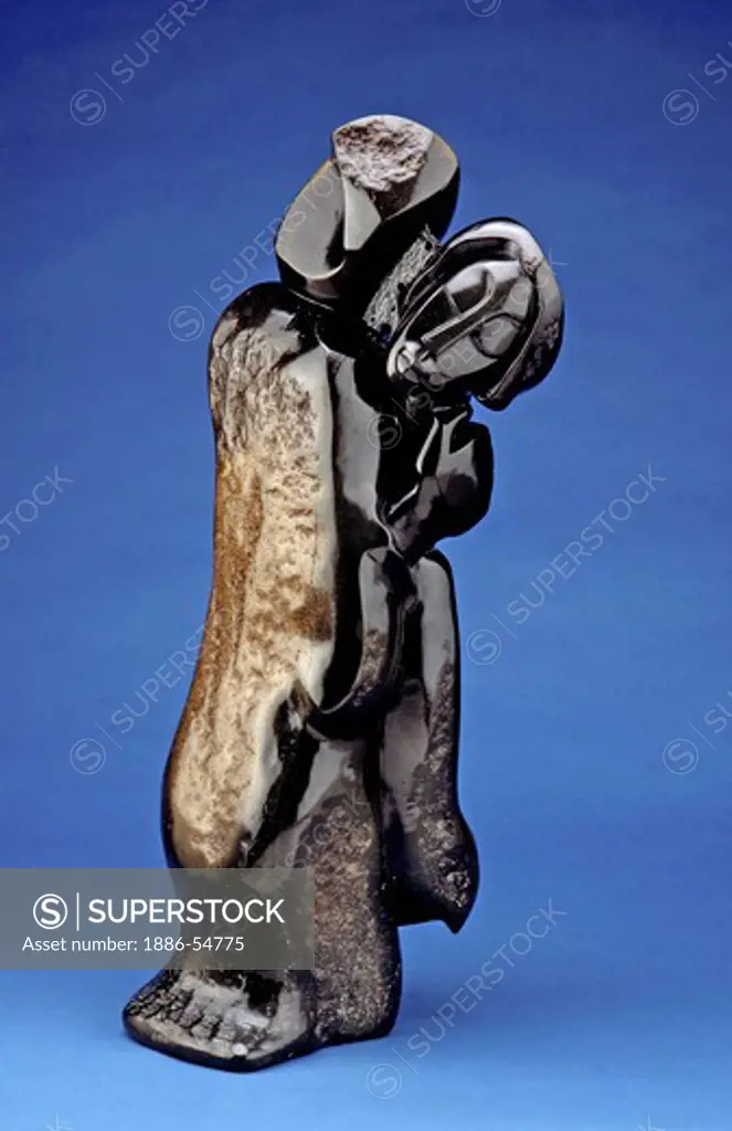 SCULPTURE of EMBRACING COUPLE (Spring Stone) by GEDION NYANHONGO - Shona people of Zimbabwe