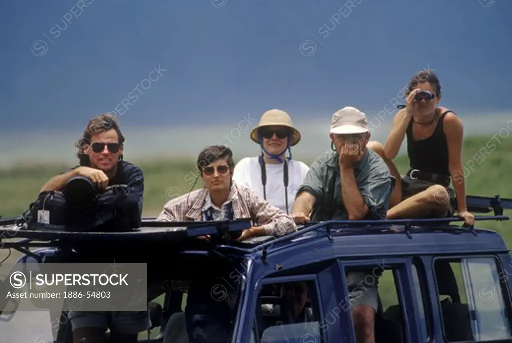 Our group enjoys their wildlife experience from the open tops of our LAND CRUISERS - NGORONGORO CRATER CONSERVATION AREA, TANZANIA