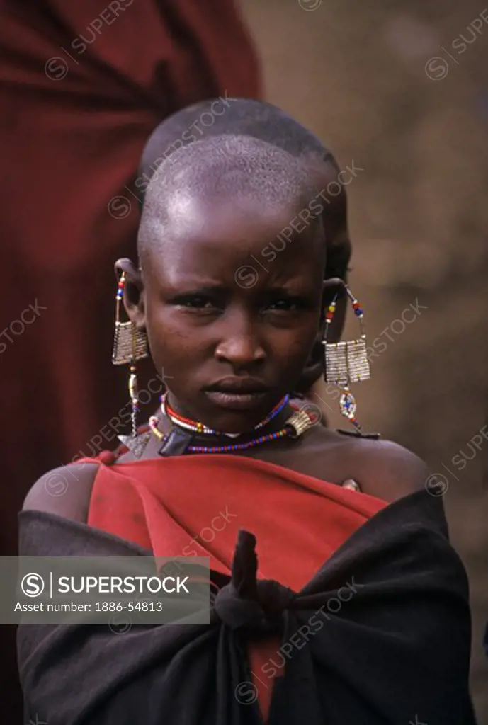 A MASSAI girl in her village near NGORONGORO CRATER - TANZANIA
