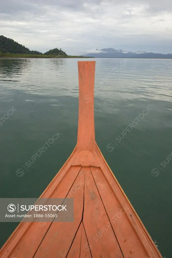 Long boat travels through the North Andaman Sea - KO PHRATHONG ISLAND,  THAILAND