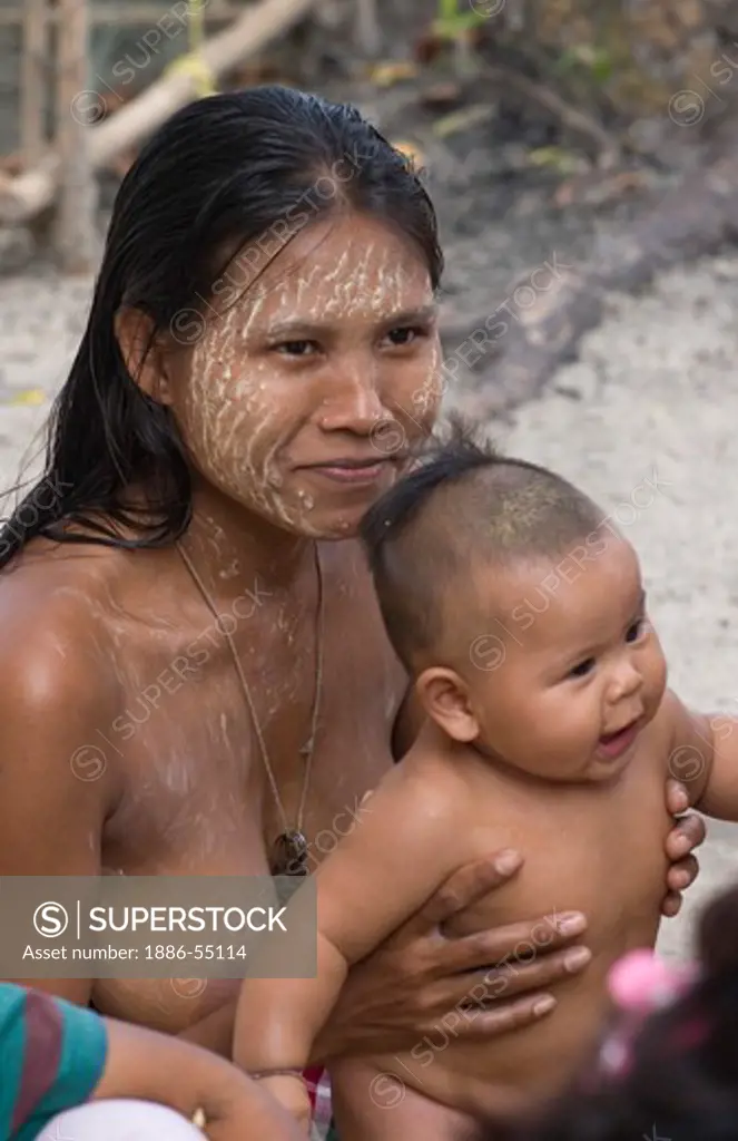 Moken (sea gypsy) women & child in her village on Ko Surin Thai Island in Mu Ko Surin National Park -  NORTH ANDAMAN SEA, THAILAND
