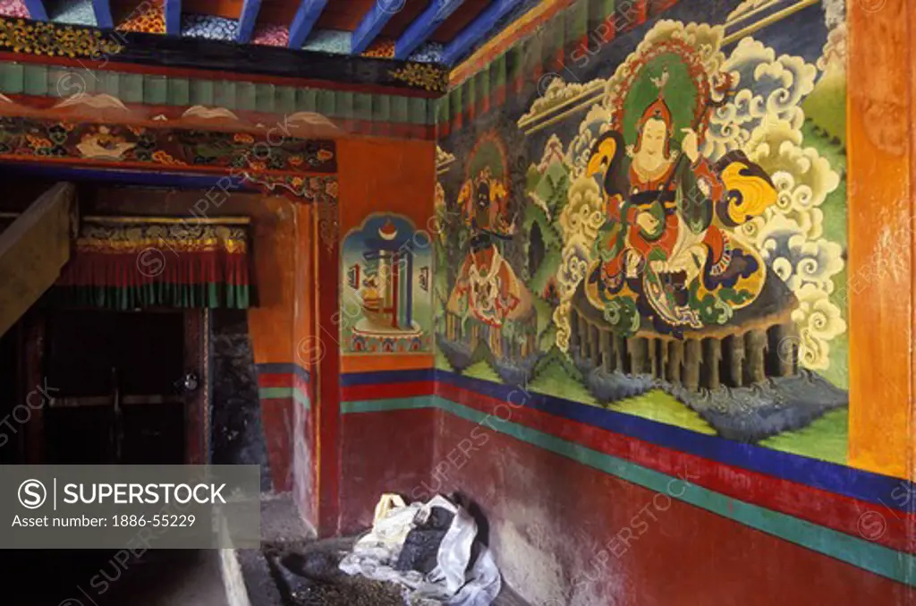 LING KESAR and another GAURDIAN DEITY are painted on the MONASTERY wall at the MILAREPA CAVE near NYALAM, TIBET