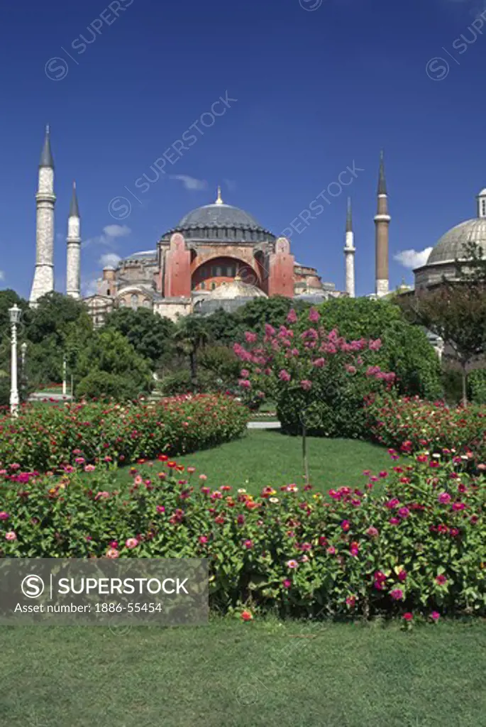Flower gardens & The Ayasofya Camii (St Sophia Cathedral) - Byzantine church originally built in 537 AD, & eventually converted to a Mosque - Istanbul, Turkey