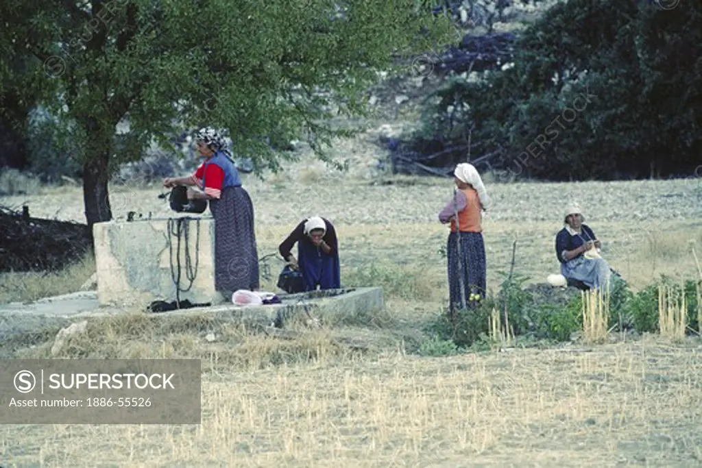 Women at the well in the rural town of BEZIRGAN - TURKEY