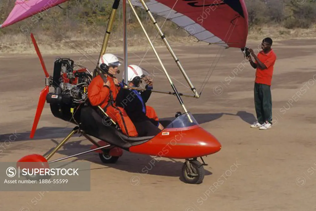 ULTRALIGHT (motorized hanglider) preparing for a flight above VICTORIA FALLS - ZIMBABWE