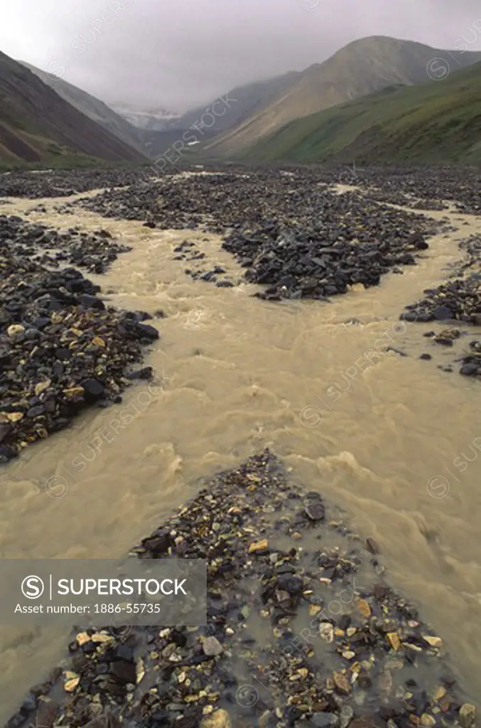 Naturally occuring minerals account for the COLORFUL RIVER ROCKS in the POLYCHROME AREA - DENALI NATIONAL PARK, ALASKA