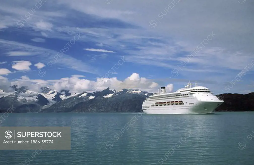 A P&O CRUISE SHIP plies the waters of GLACIER BAY NATIONAL PARK - ALASKA