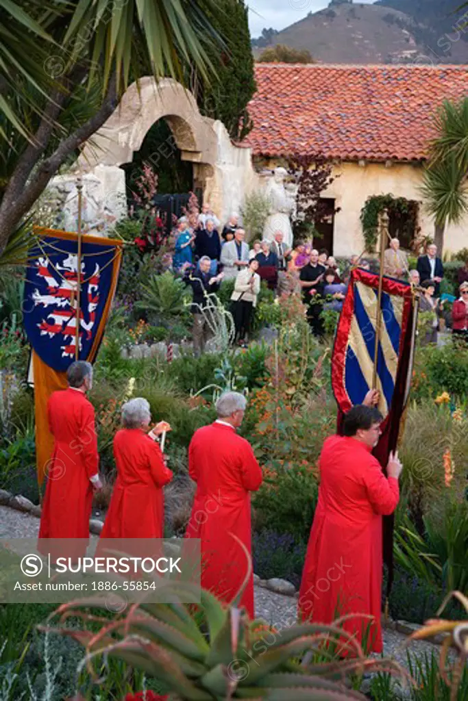 Church members carry banners while musicians play classical music during the CARMEL BACH FESTIVAL - CARMEL MISSION,  CALIFORNIA
