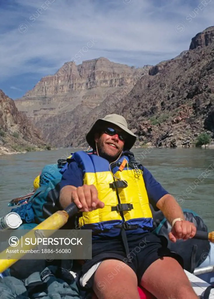 Man captains our oar boat - GRAND CANYON NATIONAL PARK, ARIZONA (MR)
