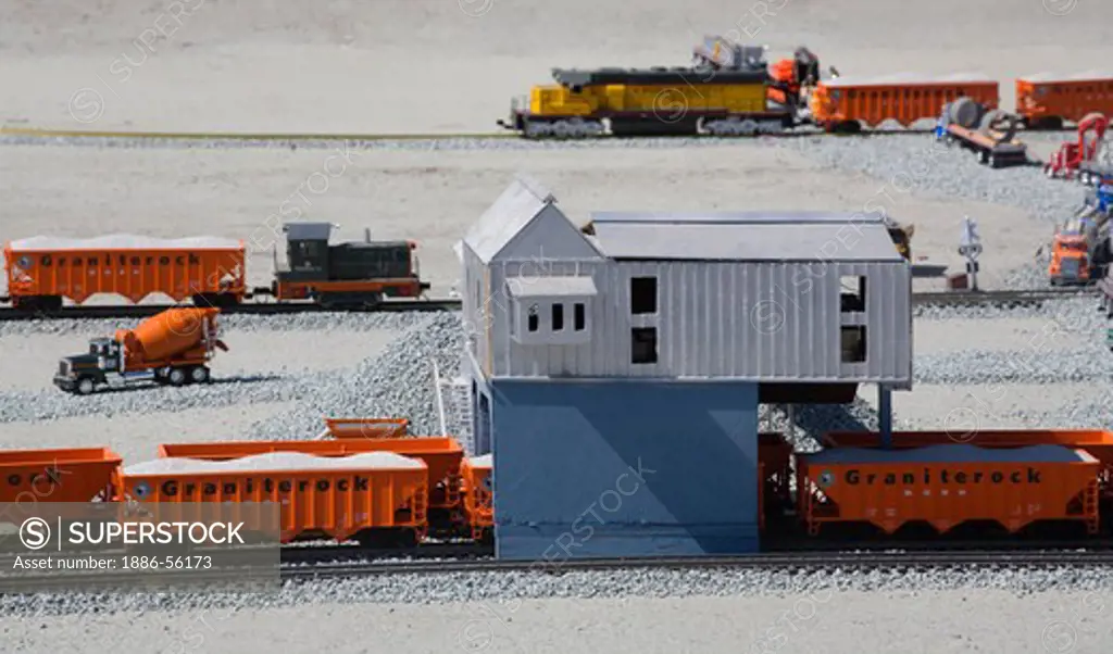 A model of the GRANITE ROCK QUARRY complete with toy TRAINS used to haul rock products to clients  - AROMAS, CALIFORNIA