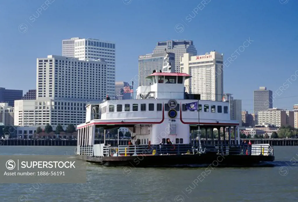 A CAR FERRY connects the FRENCH QUARTER  with the city of GRETNA by crossing the MISSISSIPPI RIVER- ST LOUIS CATHEDRAL in the FRENCH QUARTER - NEW ORLEANS, LOUISIANA