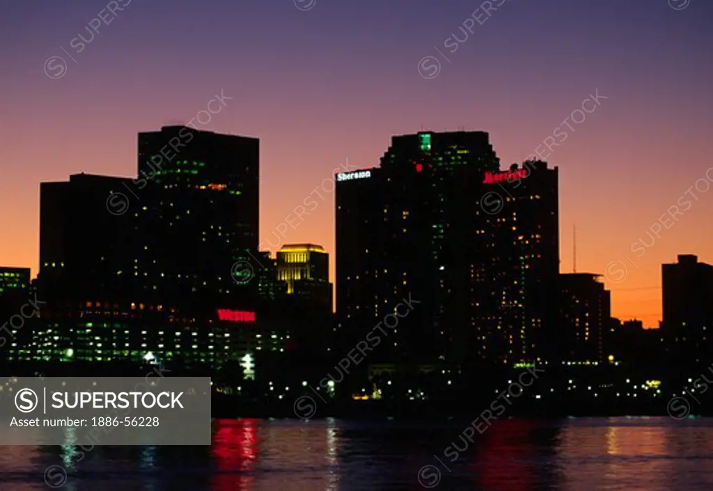 NEW ORLEANS as seen at night across the MISSISSIPPI RIVER - LOUISIANA